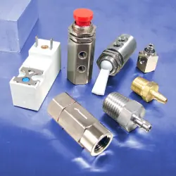 Solenoid operated valves and barbed fittings